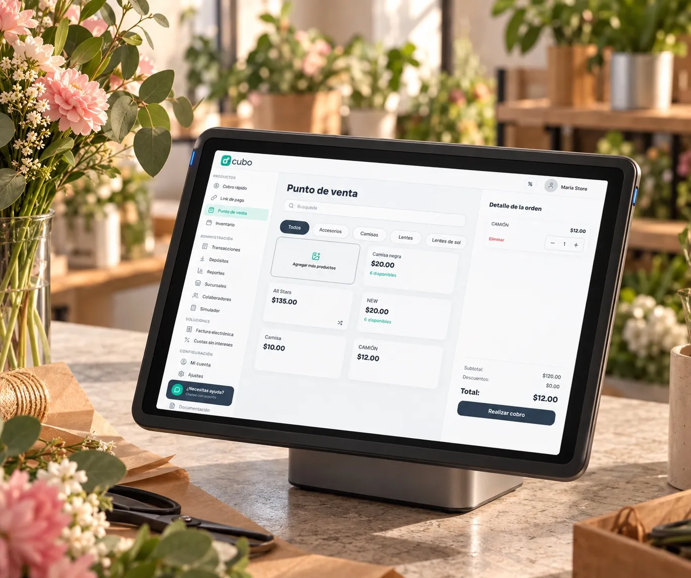 El Punto de Venta de Cubo en una tablet sobre el mostrador de una florería